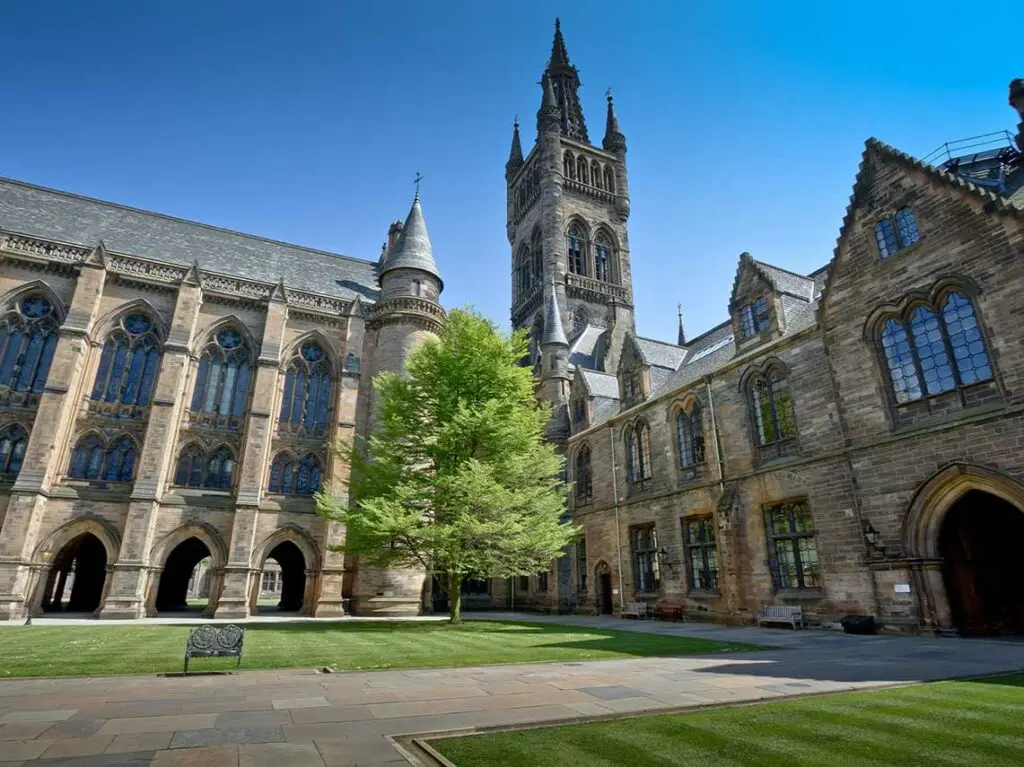 Historic courtyard and tower of the University of Glasgow, a famous landmark and tourist attraction in Glasgow, Scotland