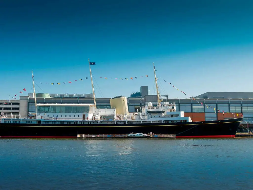 Royal Yacht Britannia docked at Leith waterfront in Edinburgh, Scotland, a popular tourist attraction showcasing British maritime history