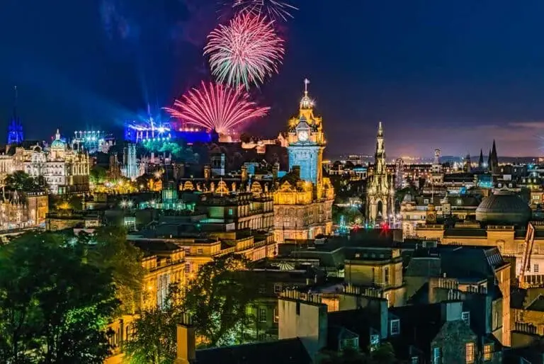 Fireworks over the historic skyline of Edinburgh, Scotland during the festival, showcasing iconic landmarks and vibrant city nightlife.