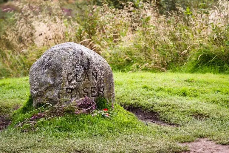 Clan Fraser grave marker at Culloden Battlefield in Scotland, a historic Scottish Highlands memorial site surrounded by grass and heather