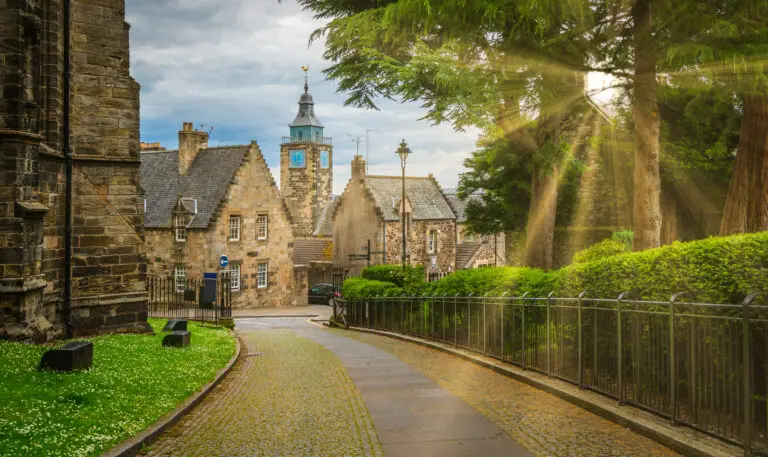 Victorian Street in Stirling on a summer day, with green trees lining a path