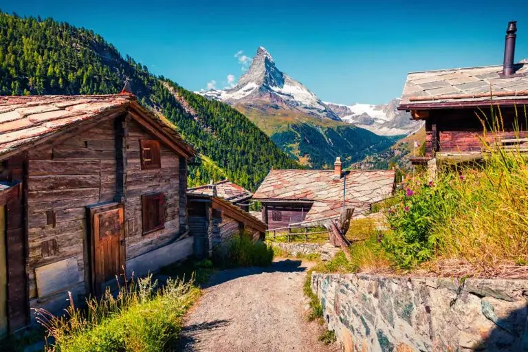 Scenic view of traditional wooden chalets in Zermatt with the Matterhorn mountain peak in the background, Switzerland alpine travel destination